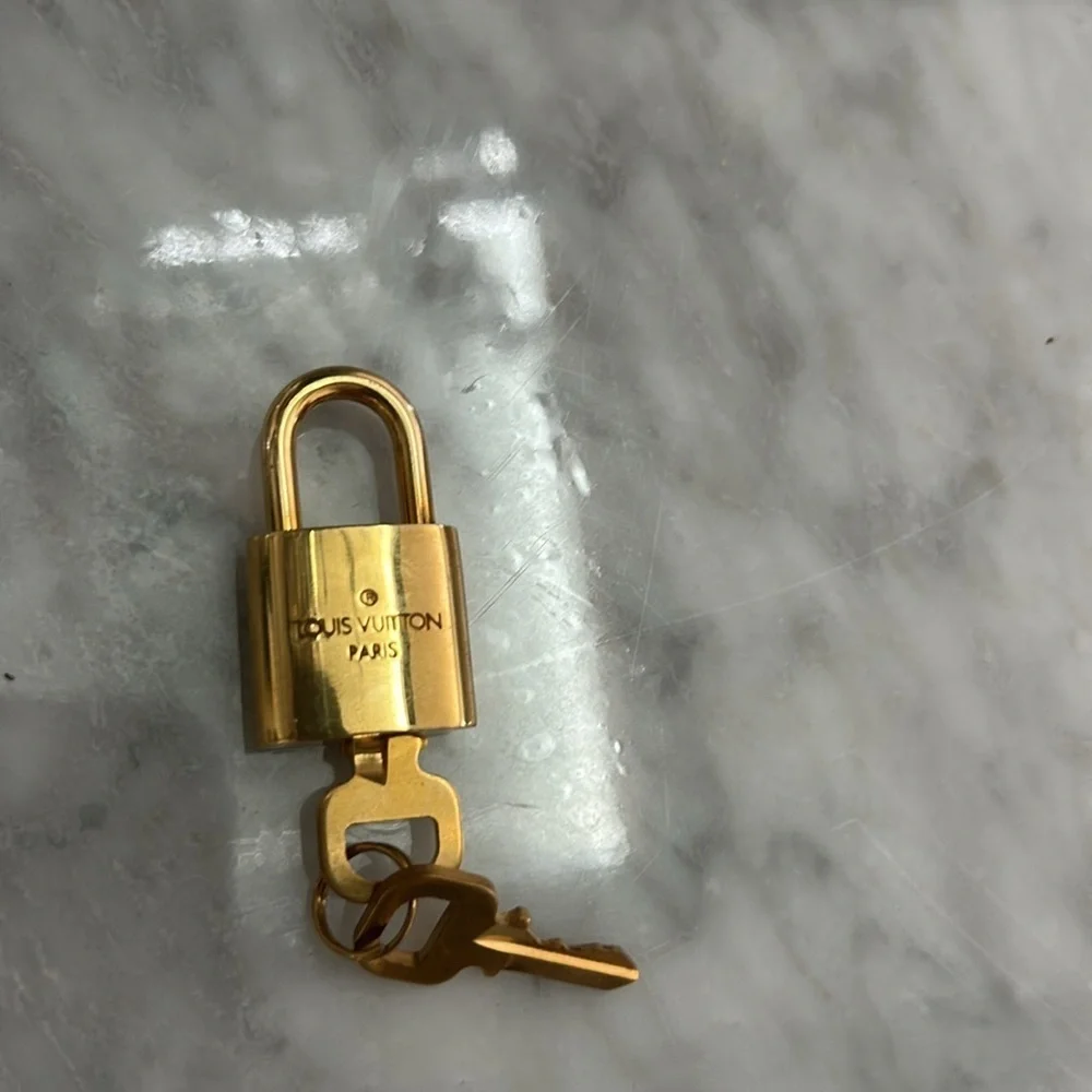 Louis Vuitton Gold Padlock and Key Set